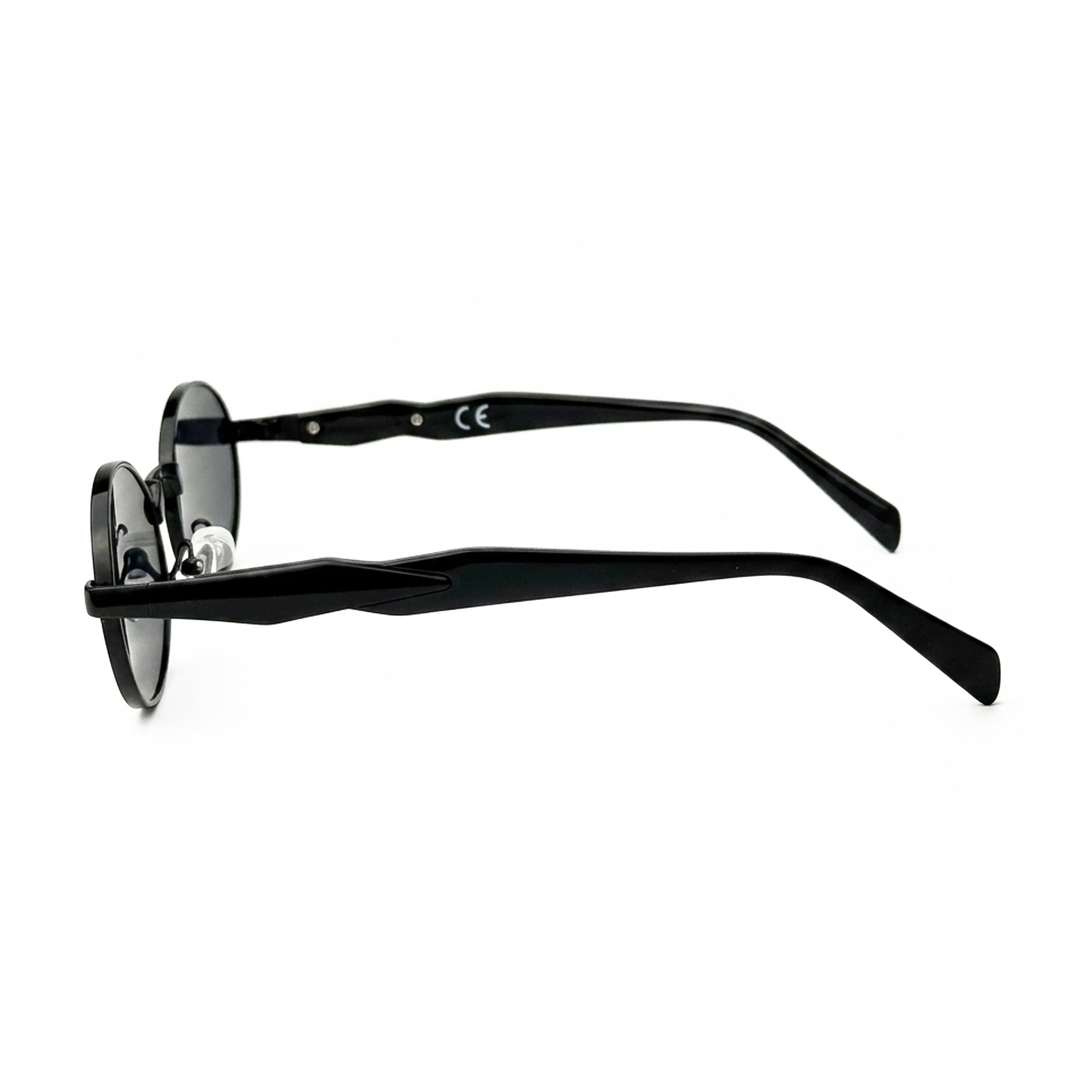 Side view of round black sunglasses with dark lenses on white background