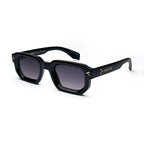 Black rectangular sunglasses with gold accents and dark lenses on white background