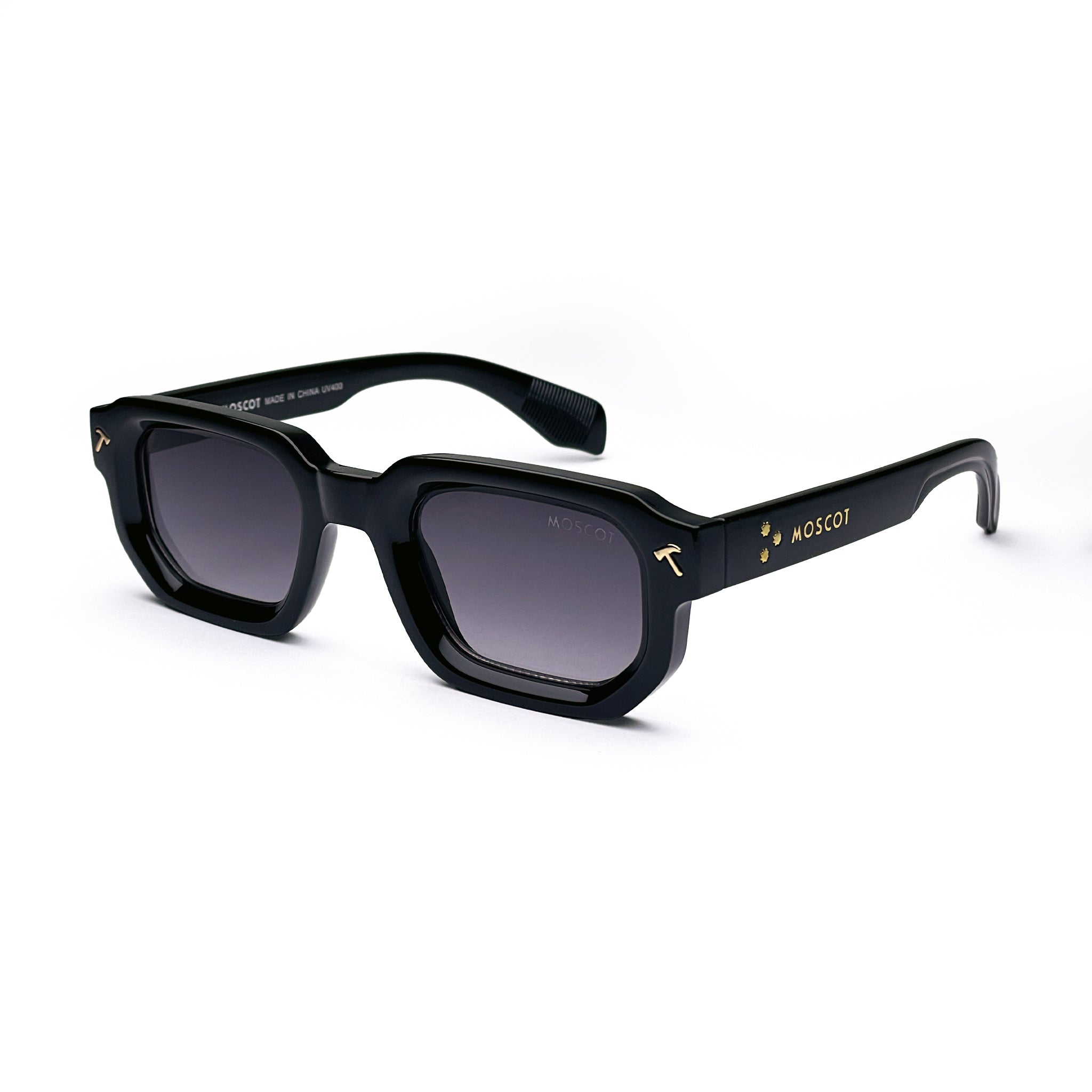 Black rectangular sunglasses with gold accents and dark lenses on white background
