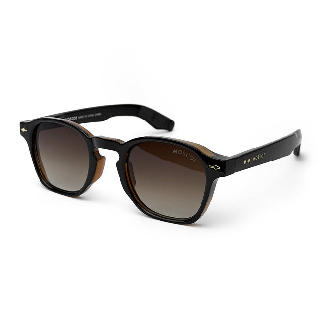 Black square frame sunglasses with brown gradient lenses on white background Hover Image