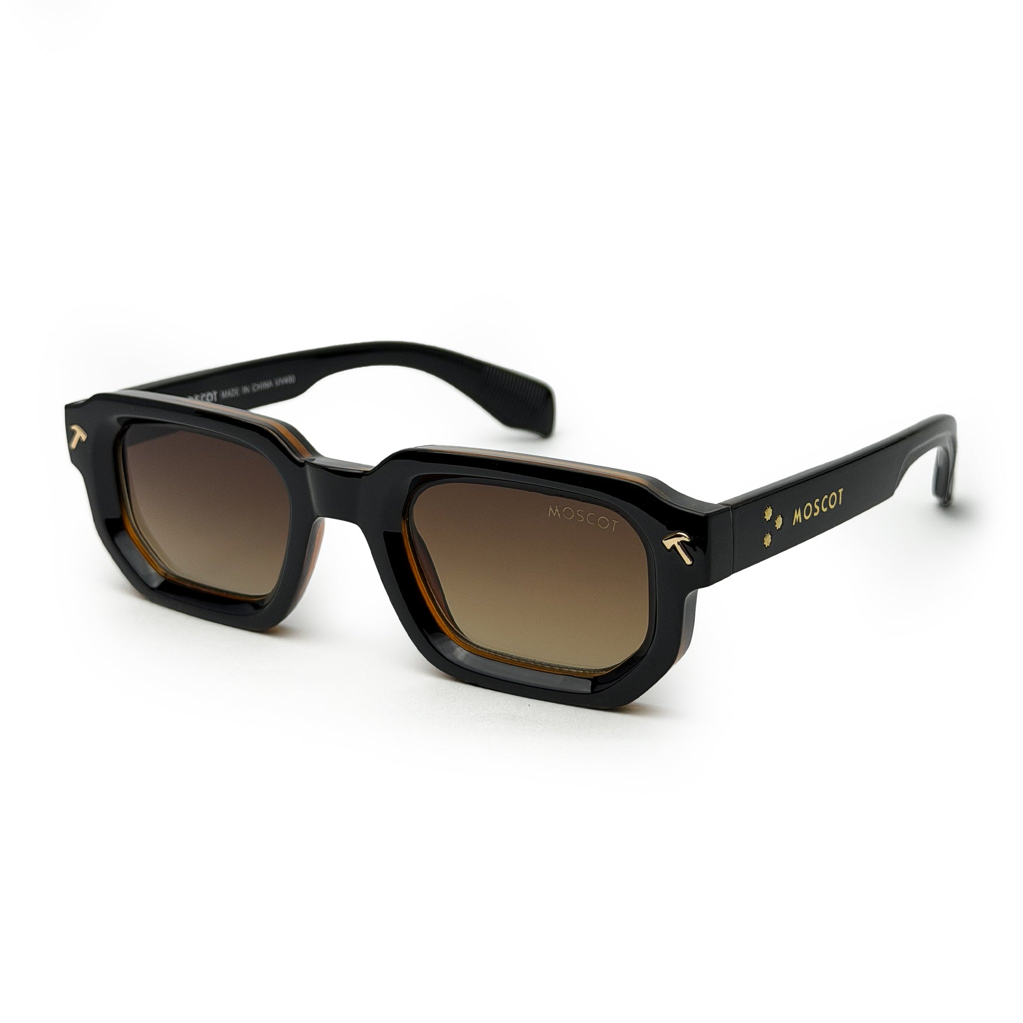 Black rectangular sunglasses with brown tinted lenses and gold MOSCOT logo on arms