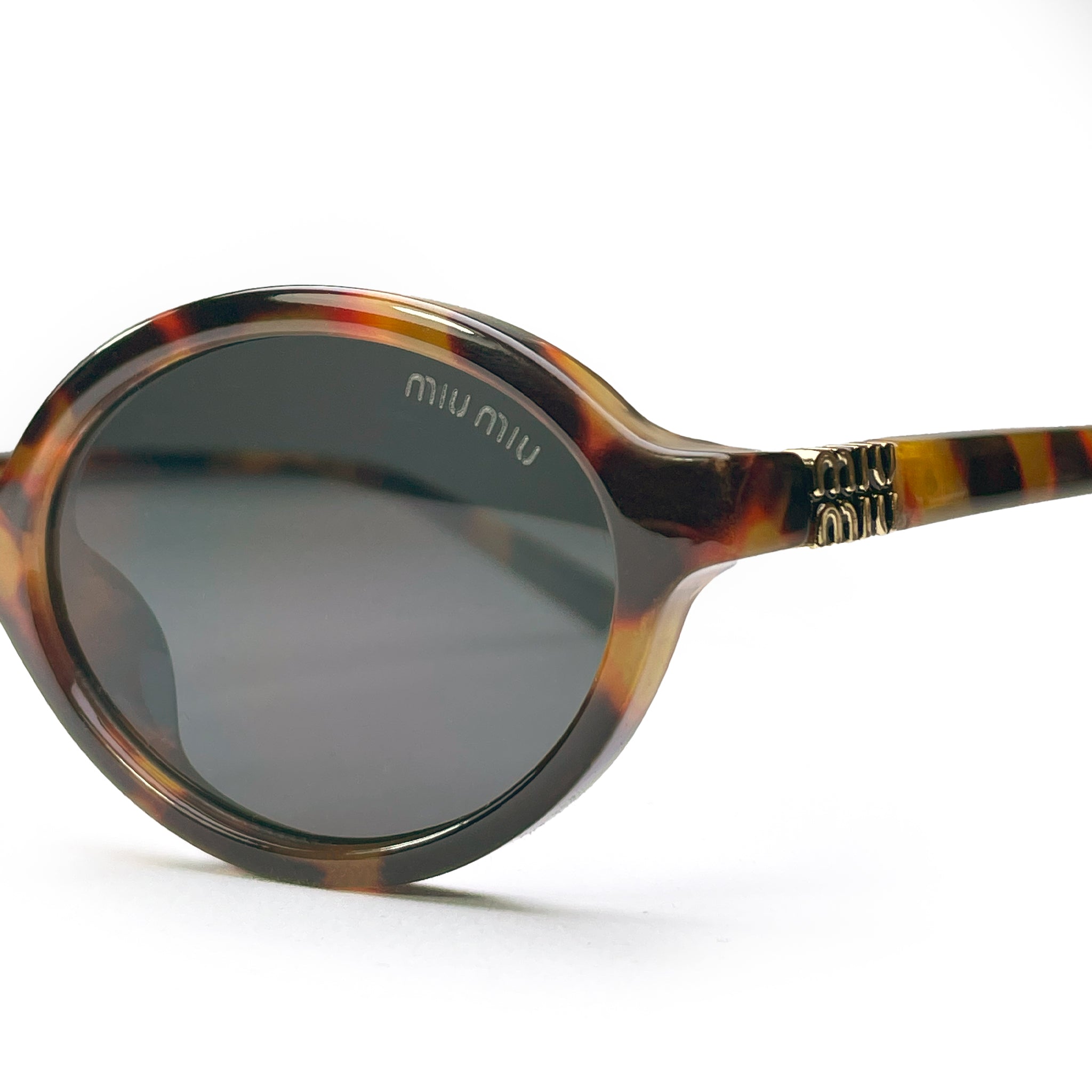 Miu Miu Tiger Black Sunglasses – Statement Women's Frame