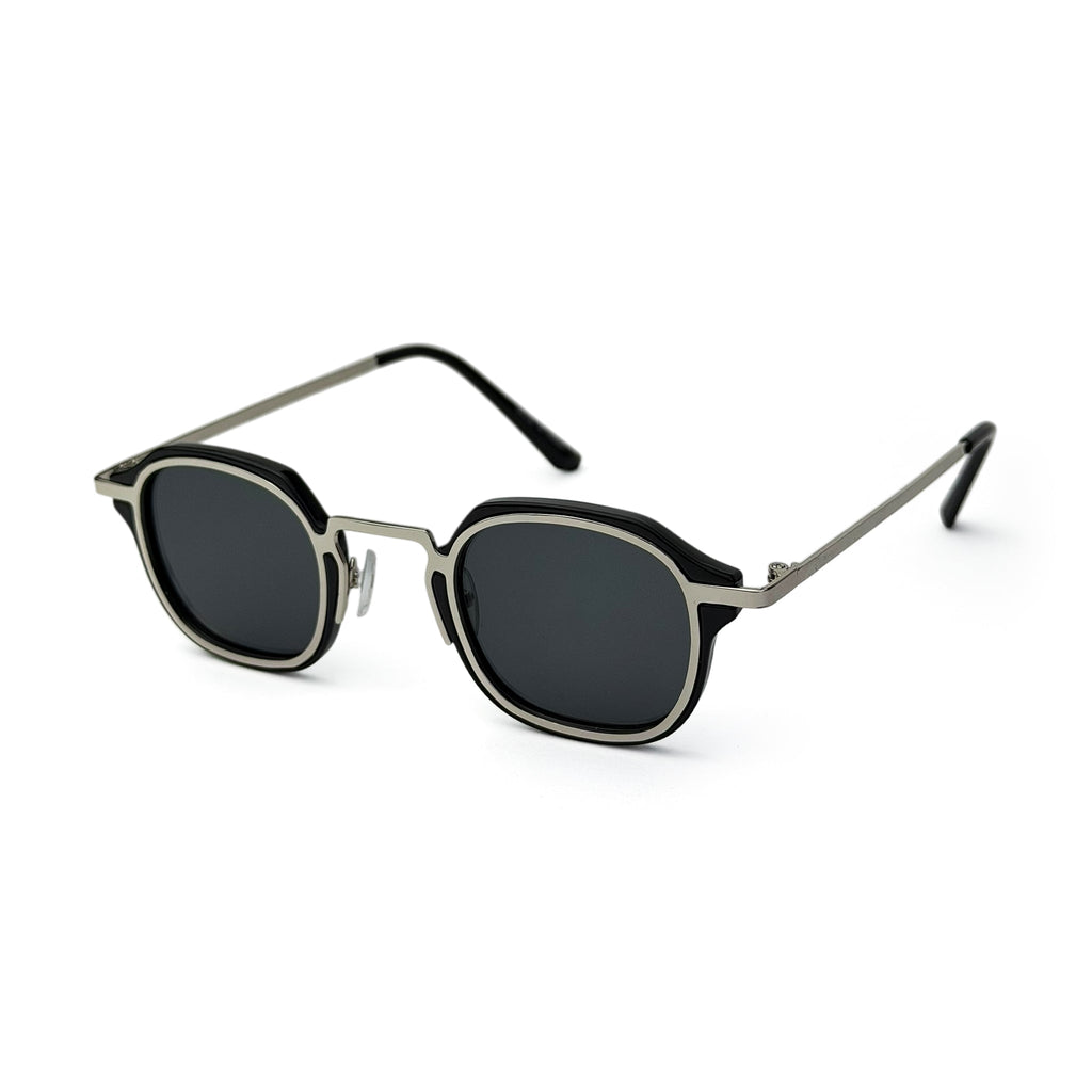 Modern square black sunglasses with silver frame and dark lenses on white background