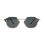 Black and silver round sunglasses with dark lenses on white background