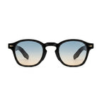Black frame sunglasses with blue gradient lenses on white background