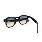 Black round sunglasses with gradient lenses and MOSCOT logo on the arm