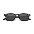 Classic black square sunglasses with dark lenses on white background