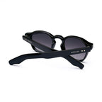 Black round MOSCOT sunglasses with dark lenses on white background