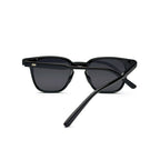 Black square sunglasses with dark lenses and glossy acetate frame on white background