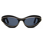 Black cat-eye sunglasses with gold trim and dark lenses on white background