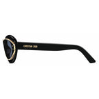 Black designer sunglasses with gold accents and bold side logo, side profile view