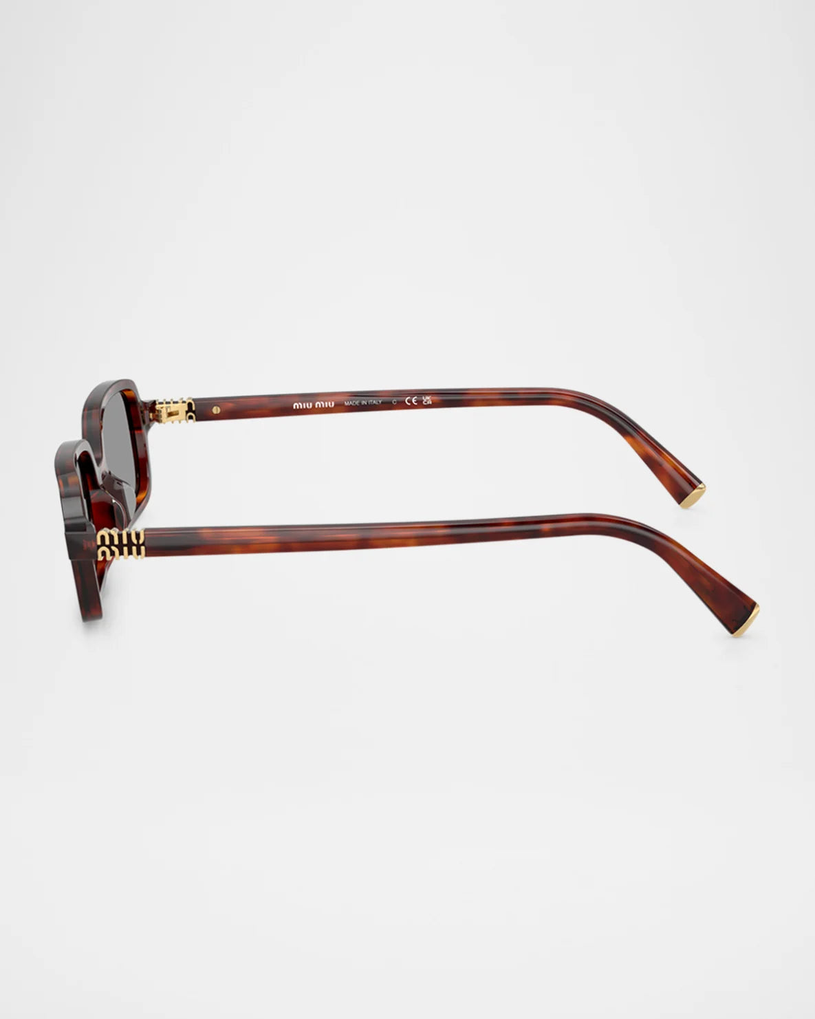 Tortoiseshell rectangular sunglasses with gold accents, side view on white background
